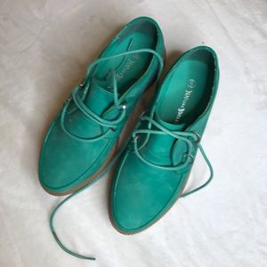 Green loafer stack